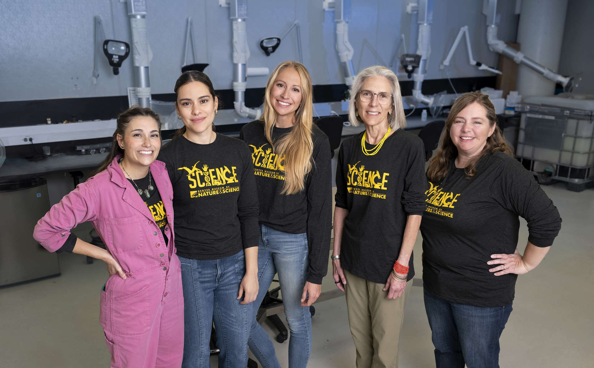large table in a room with a lot of technical equipment for preparing fossils