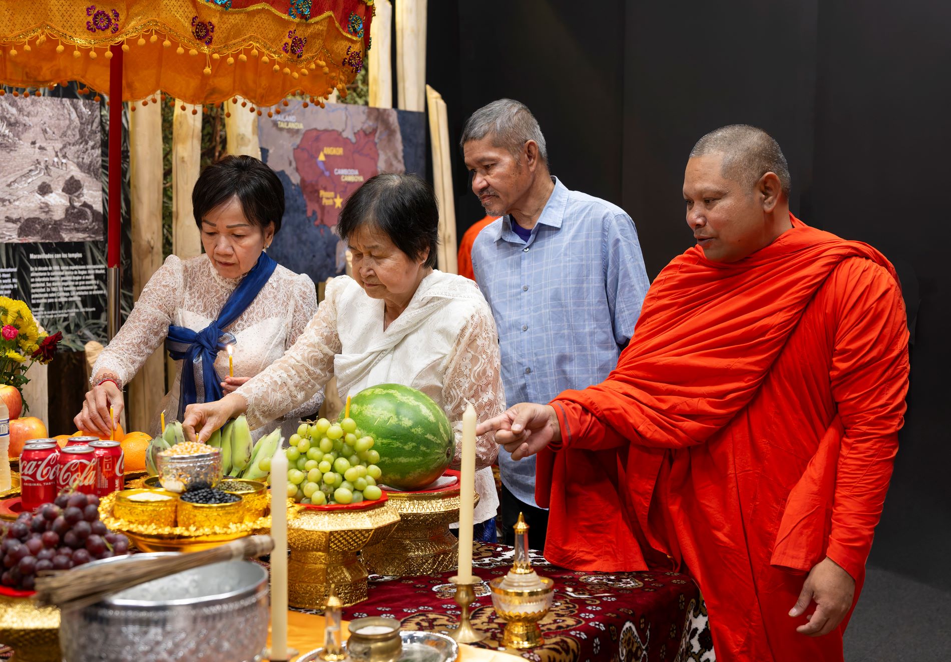 Locals from the Cambodians community hold a blessing ceremony with Buddhist monks to open "Angkor: The Lost Empire of Cambodia" at the Denver Museum of Nature & Science on Feb. 14, 2025. (Photo/ Rick Wicker)