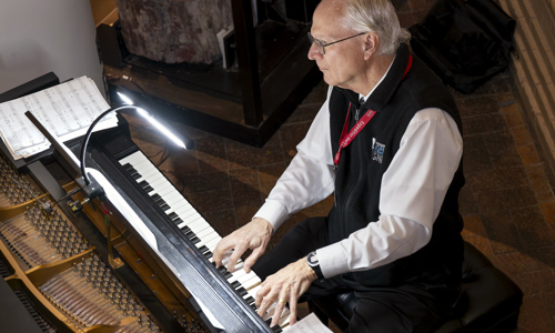 Person Playing the Piano