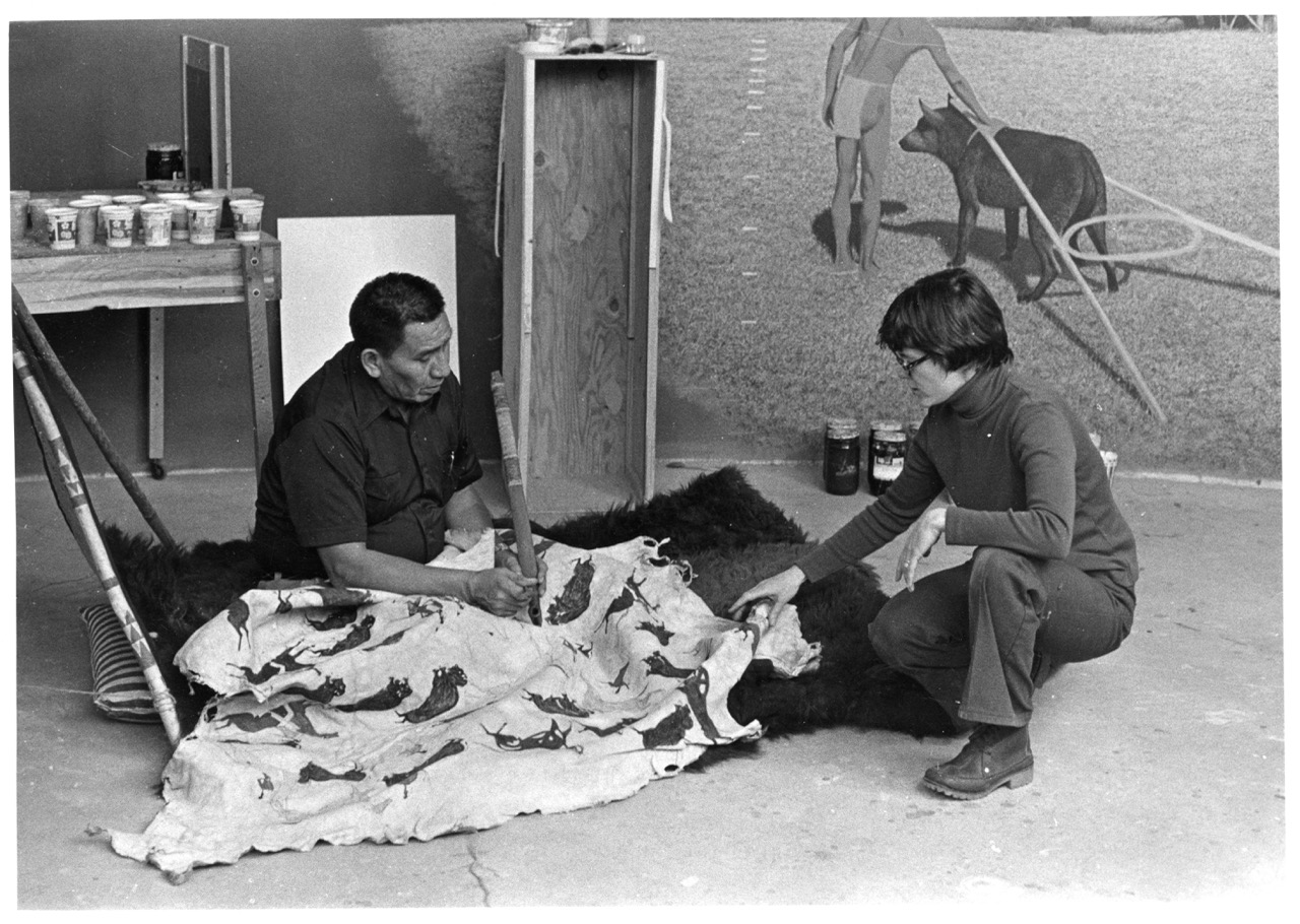 Richard Tallbull, Southern Cheyenne, and Joyce Herold, former DMNS curator, discuss exhibition components in the Cheyenne Diorama, a central exhibition in NAICH (Photo: Denver Museum of Nature & Science)