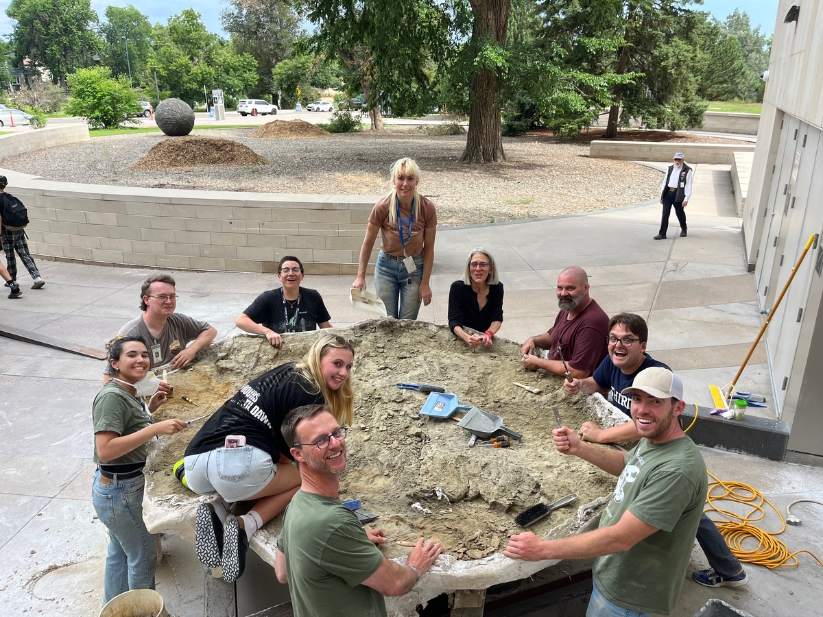 The team removing the rock matrix outside the Museum before pushing it into the Museum’s loading dock.