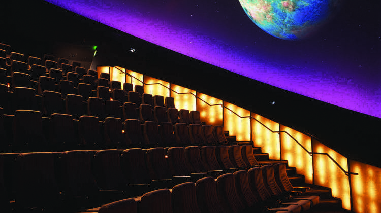 Planetarium seating with image of Earth projected