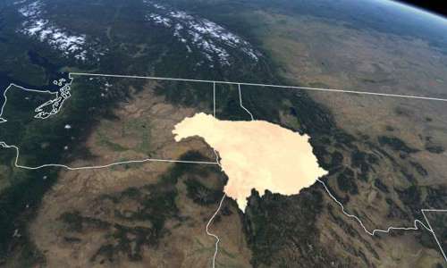 Aerial view of a map of the northwest United States with a large patch of various colors of cream covering northern Idaho