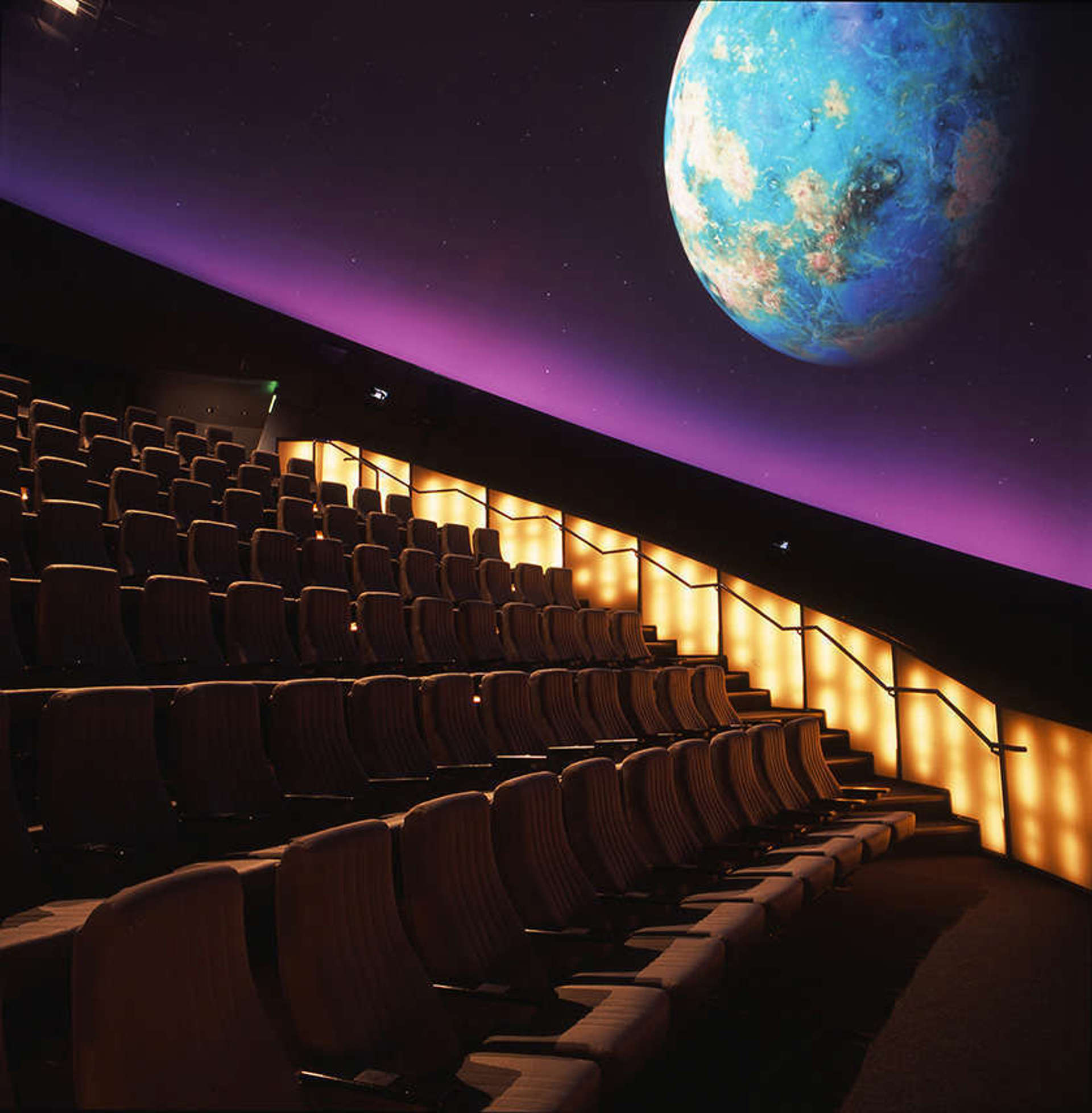 Planetarium seating with image of Earth projected