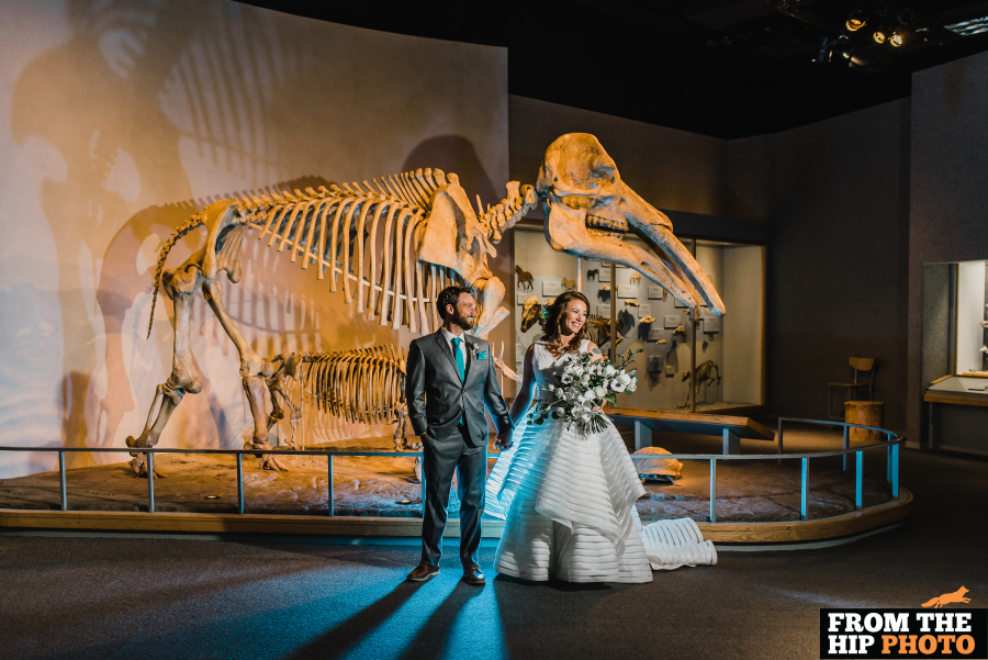 A bride and groom in Prehistoric Journey
