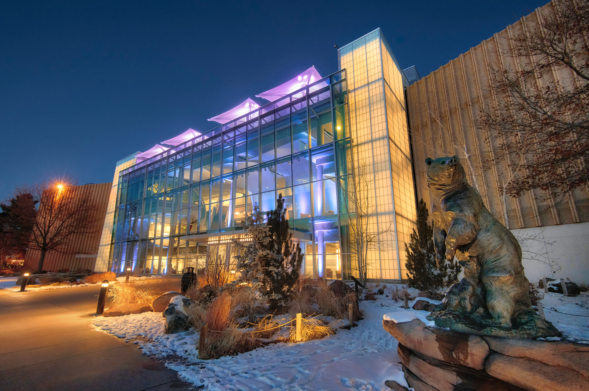Exterior view of the west side of Denver Museum of Nature & Science in the wintertime dusk. (Photo/ Rick Wicker)