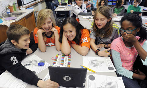 Children connect virtually through a tablet